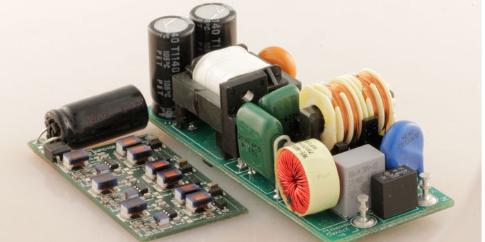 A normal LED lighting power supply compared with a prototype of the entrepreneur’s new mini charger. Photo: Private