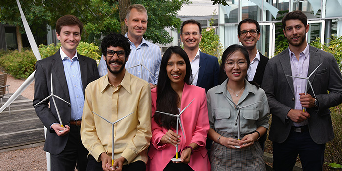 The eight graduands after the graduation ceremony